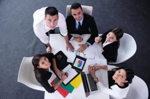 Group of happy young business people